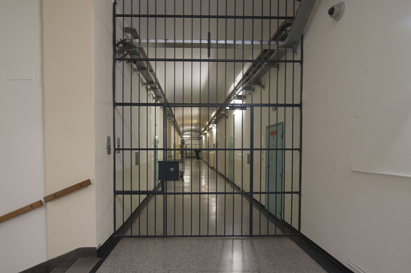 the empty corridor of a prison, no prisoners or guards