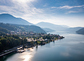 Millstatt city at Lake Millstatt in Carinthia. Scenic aerial panorama of the touristic region in South of Austria.