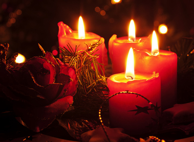 Christmas decoration with candle light as closeup